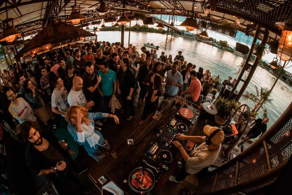 Kućica, nightclub in Belgrade on the Sava River, known for its chill vibe and great music.