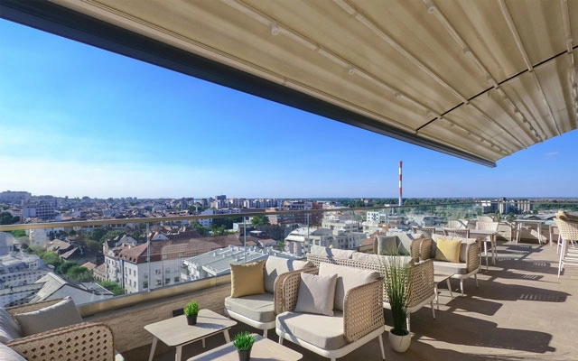 Prezident Palace Sky Bar offers a sophisticated yet comfortable atmosphere with a pool, great service, and stunning views of the city and the Danube River, making it ideal for a relaxed evening drink.