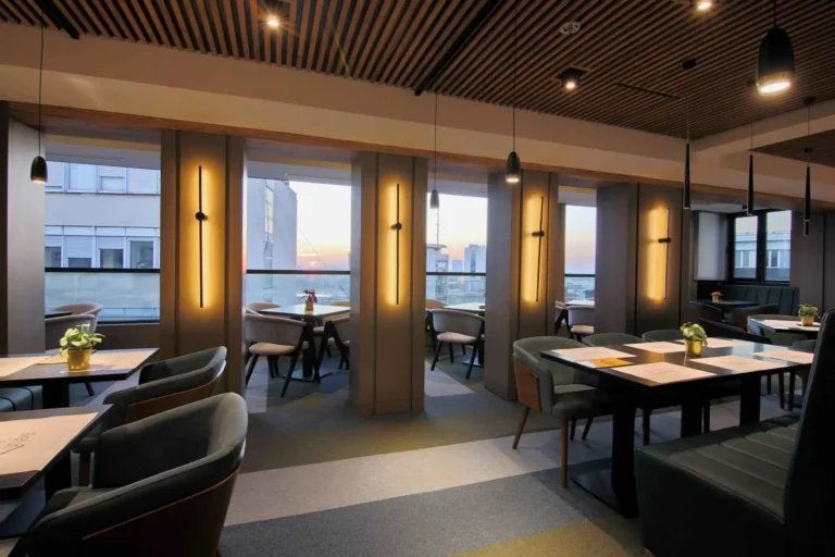 Sky Bar Zukaya is an elegant rooftop bar inside Hotel Lumiere, perfect for relaxed conversations and enjoying Asian-inspired cocktails in a stylish, cozy setting.
