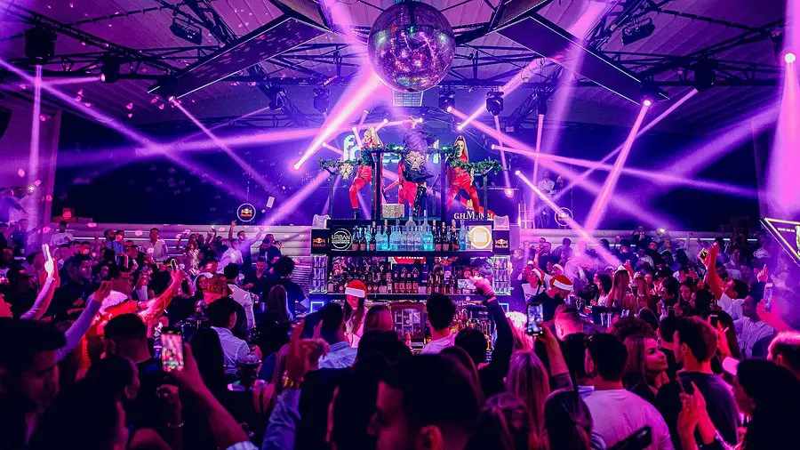 Belgrade nightlife scene with floating river clubs along the Sava